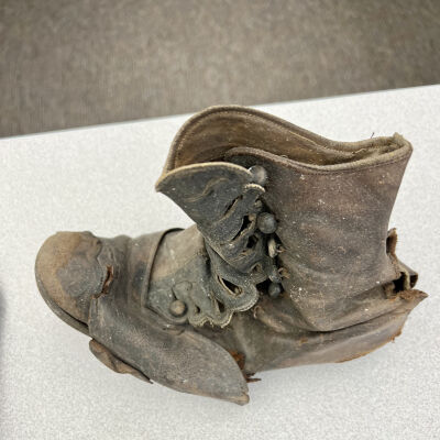 5. Larger child's high top shoe