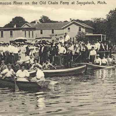 CWPC-0094ChainFerry.JPG 446KB: Heavily loaded old chain ferry scow with many rowboats. Tourists Home and east side ferry landing in background.