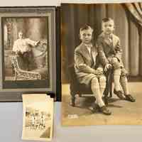          Charles as a frilly todder, brother on tricycles and dressed dapper for studio shot
   