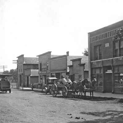 DouglasPostOffice.jpg 1.6MB: Circa 1910 - Electric car driving west, buildings are on south side of Center Street between Main and Spring. Today only Everyday People (at the far end) and the Kerr Building still stand on this block. Signs in Kerr Building for Millinery and Douglas Post Office.
A darker version of this image is in Archive Box 31, envelope 95-61-1