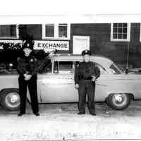          89-1-216_Saugatuck_Police_1956.jpg 615MB; Box 31, envelope 89-1-216 Officer ______ and Julio Mocini
   