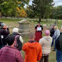          Linda Slusar telling about the life of Julia Morrison Francis at the Francis family gravesite; Event photo provided by Linda Slusar
   