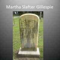          29 GILLESPIES- I am Martha Slafter Gillespie, my husband and I have the most famous and frequently photographed tombstones in the Douglas Cemetery. When I died May 12, 1893, the day started out in the ordinary way, I did not feel ill, did the family washing, came inside, sat down and died. I had always been a devout Christian woman, and someone (but maybe not my husband) knew I would want to have my tombstone reflect that. The inscription begins “I die a Christian.” And after my name it continues: “I leave this earth, for the glory of heaven to draw nigh to God until we meet again at heaven’s  gate.”
[1836-1893 apron, gray wig, white hat?]
   