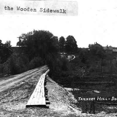 6-14 Wade house on Tannery Hill.jpg 449KB: Note the wooden sidewalk, Tannery Hill - Douglas