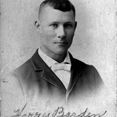 89-1-14 H. Barden.jpg 373KB: Studio portrait of Harry Barden, a clean cut young man in suit and bow tie.