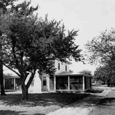 KingsleyHouseSnapshots2003 pg30.jpg 1.7MB: Caption from "Snapshots" page 31 - Kingsley House and Orchard, circa 1925. Ferry and Center Streets, Douglas (now West Shore Golf Club). This orchard dates back to the 1870's, when over 800 peach trees were planted. In 1920 the farmer, Douglas Kingsley, turned his orchard into a golf course, "the sportiest course in Michigan."