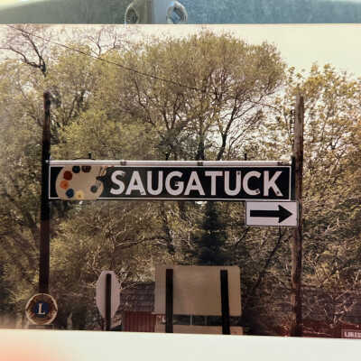 Holland St. location: From Lorenz collection signs binder: Time stamp on back of this or the other Lorenz photo is May 1986
