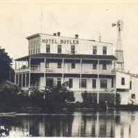          8.3ButlerWithWindmill.jpg 505KB; West side of Hotel Butler. Note the windmill.
   