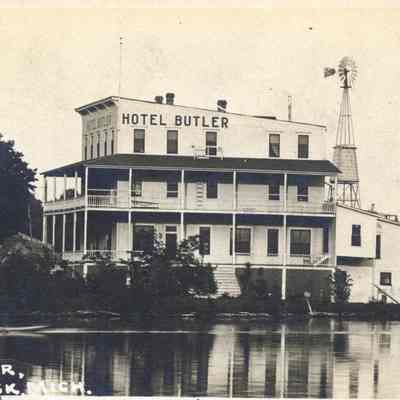 8.3ButlerWithWindmill.jpg 505KB: West side of Hotel Butler. Note the windmill.