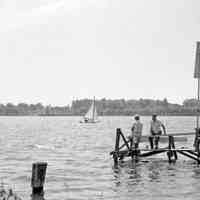          HM West side ferry dock.jpg 735KB; The sign next to the men was used to signal the ferry.
   