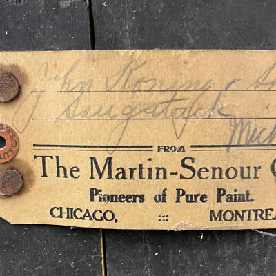 detail of tag on back of sign: John Koning & Son, Saugatuck Mich