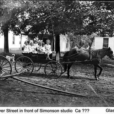 sim pony cart .jpg 1.1MB: Carriage filled with young children being pulled by a dark pony. JOS: Culver Street in front of Simonson studio Ca ??? Glass plate. The street is unpanved.