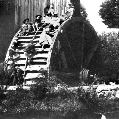 LO35 Children on mill wheel: There were many children to pose on the old mill wheel.