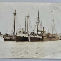 Steam barge and tow barges c1895