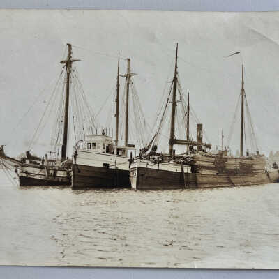 Steam barge and tow barges c1895