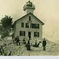          Baker_family_lighthouse_posed.jpg; 2.2 MB  Digital file at 2021.72.02
   