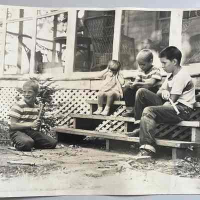 Buz, Mary, Charlie & Johnny Dempsey at 109 Lakeshore: Photo by Don Heuchan of St. Louis, MO. Date stamped July 4, 1952.