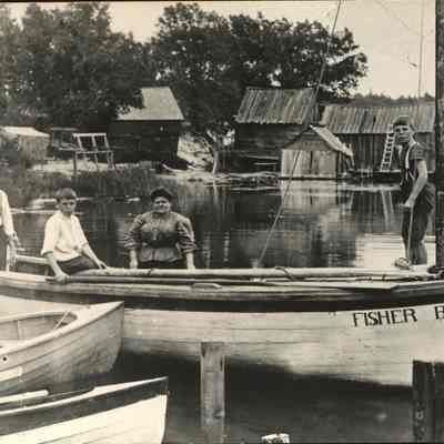 FisherBoySewersFamily.jpg 1.6MB: Sewers family Mackinaw fishing boat at Fishtown circa 1910