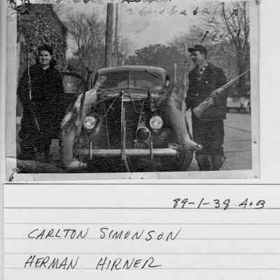 89-1-38 Buck Hunters.jpg 513KB: Carlton Simonson Herman Hirner - two men with rifles and two deer tied to the hood of a car.
