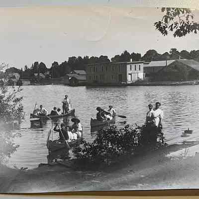 Canoes crossing river at Tourists Home
