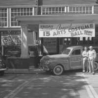          hmbPavilion cars and ads 502 KB from Rob Carey CDs; Annual Arts Ball banner
   