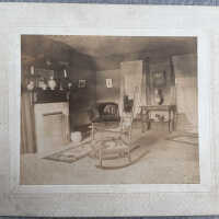 Rocking chair by the fireplace