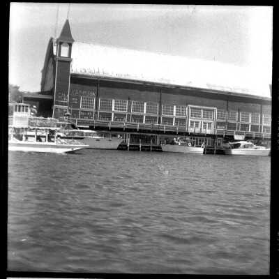 Pavilion_ca_1955: pavilion with light colored roof and Island Queen at left.