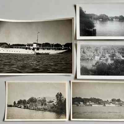 Clockwise from upper left: Large motor yacht anchored in Kalamazoo Lake; Hungerford River House as seen from opposite bank; Sewers-family fishing operation and shanties as seen from Mt. Baldhead; Riverbank buildings with signs for "Camera Shop" and  "Edgewater" behind a moored yacht and tugboat; Fishtown