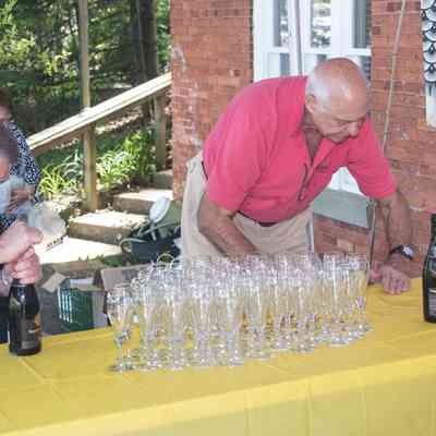 2015 Water museum opening party: CD #14 - Photo by Elliot Sturm: Arthur Ashley manhandles a champagne bottle, Ed Kelly fans napkins