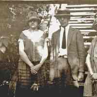          95-52-1bpeople_by_mt_baldhead.jpg 372KB; A man and two women in 1920s-style clothing at the base of a staircase.
   