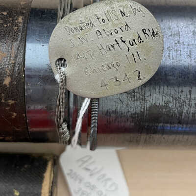 Metal tag attached to telescope