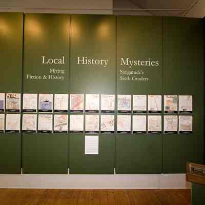 Sixth-grade student contributions to the exhibit.: exhibit south wall