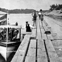          The Georgie R with a load between the piers ca 1910; vessel Georgie R ca 1910
   