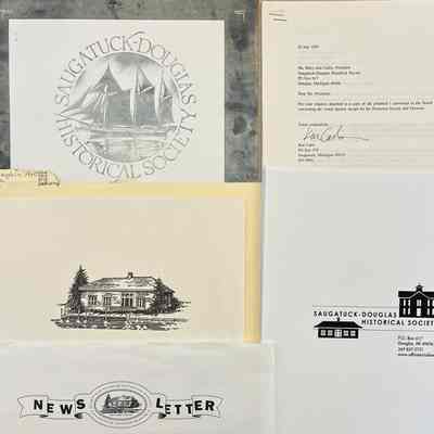 The first logo, featuring a sailing ship, was replaced by an image of the Saugatuck Pump House when that property was secured for SDHS use.