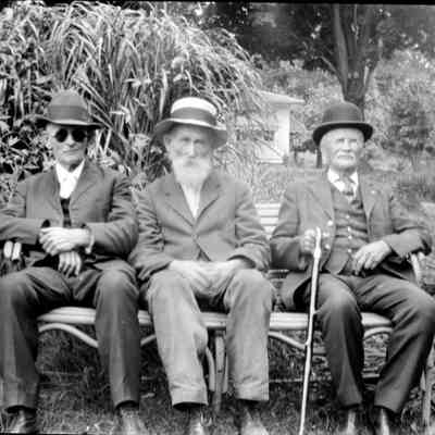 unk006.jpg 353JB Charles Billings seated in center of bench: Possibly related to the negatives, this digital scan of image "donated 8-18-01" in folder titled "Ted Kimble donated" on a CD belonging to James Schmiechien.