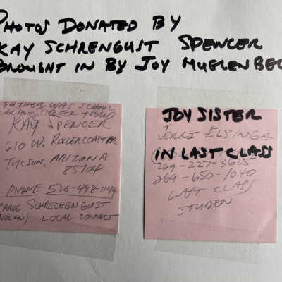 Notes on the inside of the folder containing the photos.