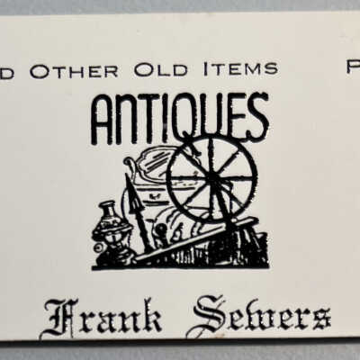 Partial business card found with the slides
