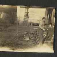          ES70009-2BudSewersOnBike.JPG 35KB; ES70009-2- Bud on Bike
   