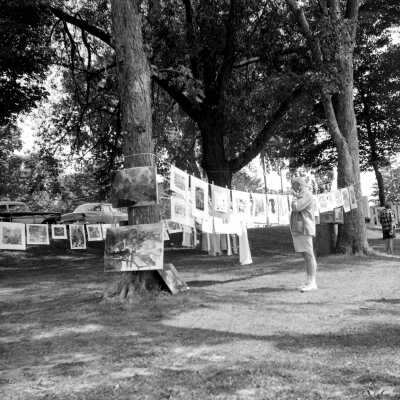 1957 Clothesline show at Cook Park - 301 clothesline art show 1957.jpg 2.2MB: W.E. Underwood views the 1953 Art Club show