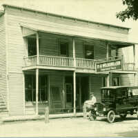          Wolbrink_store; Ganges (Blue Star Highway) It still stands and looks a lot like this. Built before 1870 as a general store—photo from early 1920s. This was Ganges first Post Office in 1879. For a time Lillian Eddy (the mother of Joan, Joyce, Barb, and Betsey), the wife of the postmaster in the 1890s, used the second floor as a private school for local children after they had graduated from high school—a sort of an early junior college. Looks like a bread delivery going on.
Source: Online 