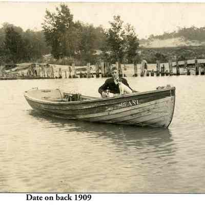 Old harbor boy and boat 1909.jpg 1.1MB