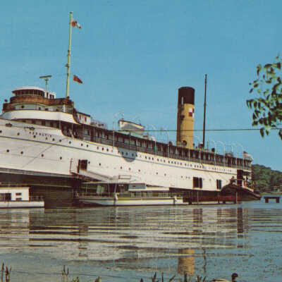 S.S. Kewatin with two houseboats: 4101 by Dexter Press, Hiawatha Card Co., Berrien Center, Mich.