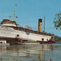          S.S. Kewatin with two houseboats; 4101 by Dexter Press, Hiawatha Card Co., Berrien Center, Mich.
   