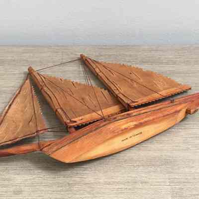 A similiar-looking ship for sale online, August 2024: https://schoonerchandlery.com/shop/affiliate/etsy/misc-affiliate-etsy-art-collectibles/small-vintage-wooden-clipper-ship-schooner-sailing-vessel-canadian-boat/