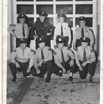 Police1956TU for comparison: Morey Herbert, Joe Dempsky [Dempski], Chief Larry Brooks, Julio Mocini, Henry Hungerford, Hilton Brown, Jim Boyce, Harry Newnham. Not pictured Bob Brackenridge and Gordon Aaldrink