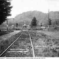          Pumphouse_95_76_1.jpg 1.9MB; A 1906 photo looking down Lucy Street and the Interurban tracks. The photo was taken from where Kirke White's house is at 200 Lucy Street. To the right is a coal shed owned by Dodie Wilson and across the Kalamazoo River to the left is the Pump House, now the Historical Society Museum. In the background is Mt. Baldhead.
-- description by Fred Schmidt
   