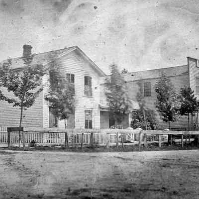 Nies house & storein ca 1880 tu.jpg 354KB: Digital file on Jack Sheridan Drive 2021.72.02 - note Taylor sign on the roof of the D.L. Barber building next door to J. Nies Hardware. This suggests the photo was from the period of the Taylor & Barber partnership of 1873 to 1879.