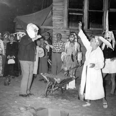 Pageant 3.jpeg 1MB: Elsa Ulbricht, in white robe, and others conducts the burial of the year ceremony at Ox-Bow, date unknown