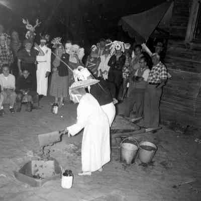 Pageant 4.jpeg 992KB: Elsa Ulbricht, in white robe, and others conducts the burial of the year ceremony at Ox-Bow, date unknown