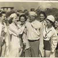          ES60035ArtFeteSmocks.JPG 720KB; Saugatuck's Art Fete opened Wednesday with the donning of the smocks. Almost everyone in town wore a smock and beret. Just to make sure that VILLAGE PRESIDENT FRANK SEWERS wore one the bevy of beauties in the upper picture 